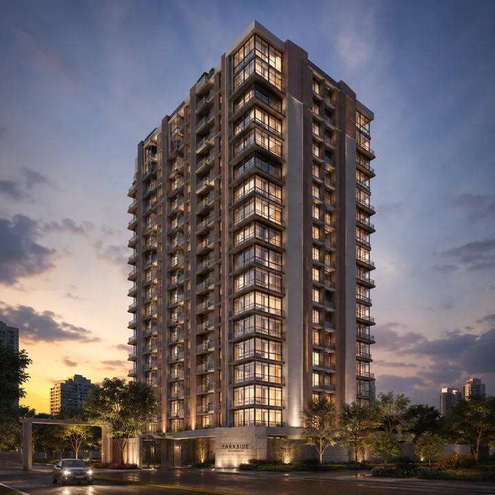Nambiar Kannamangala tower exterior - Ground+20 elevation at dusk in brick, stone and exposed concrete Nambiar Kannamangala tower exterior - Ground+20 elevation at dusk in brick, stone and exposed concrete
